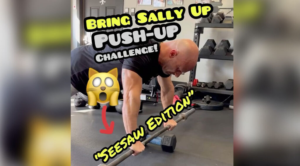Joe DeFranco Demonstrates the Sally Seesaw Pushup Challenge